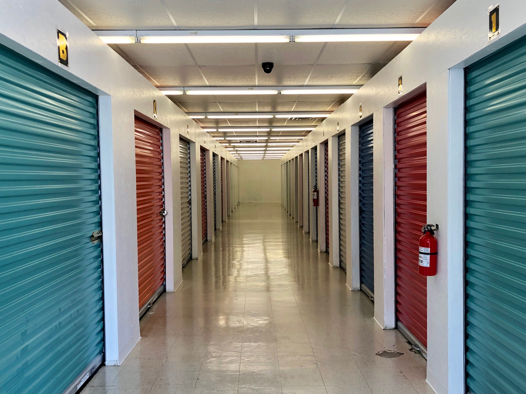 Blue and red doors in storage hallway